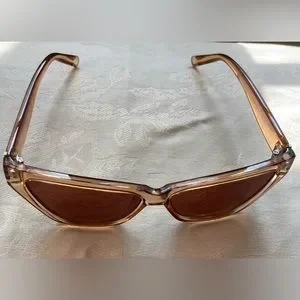 Kendall + Kylie Emma Cat Eye Sunglasses Tan Crystal
Frame Brown Lens Kendall & Kylie | Accessories | Kendall Kylie Emma Cat Eye  main image 4